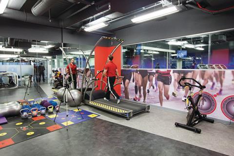 The shop houses a gym and plenty of equipment for customers to measure performance and test shoes